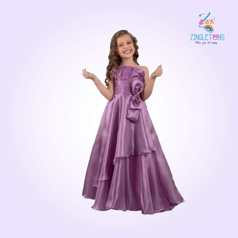Designer Mauve Bow Embellished And Stone Work Party Wear Gown For Girls